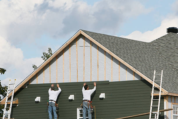 Professional Siding Installation technician working in Winburne, PA